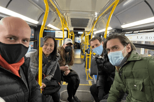 Students snap a picture on the bus during a NYC meetup